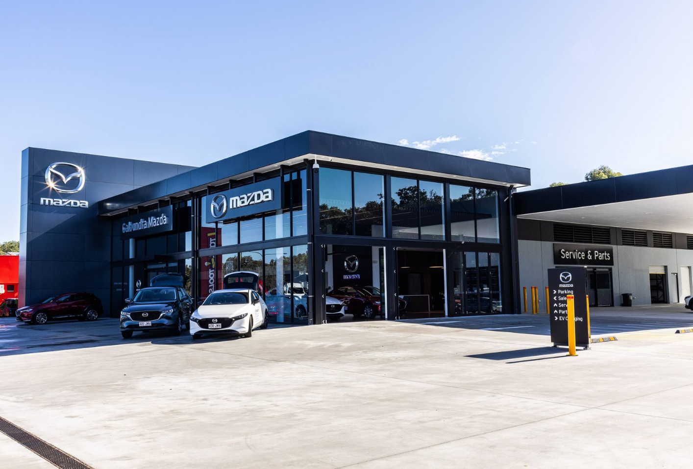Front view of the Mazda Caloundra Commercial Showroom, where Huff Group installed modern power and lighting systems