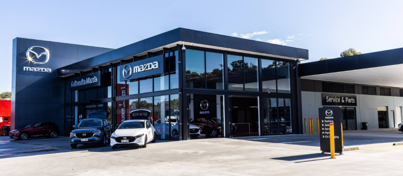Front view of the Mazda Caloundra Commercial Showroom, where Huff Group installed modern power and lighting systems
